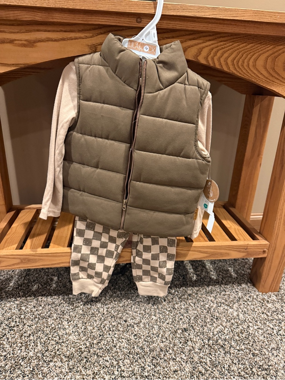 Quilted Brown Puffer Vest with Cream Long Sleeve and Checker Pants